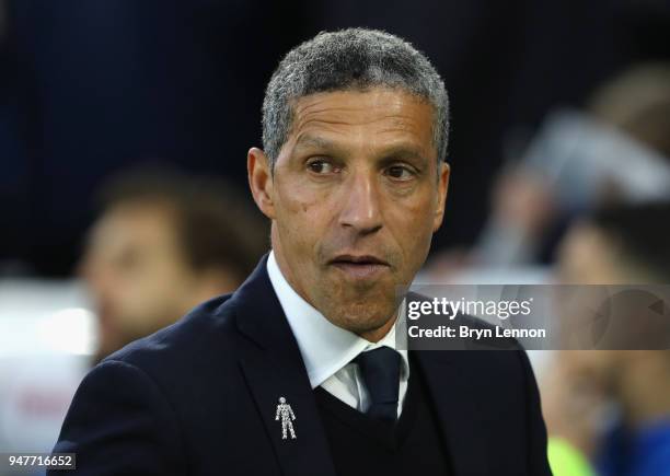 Chris Hughton, Manager of Brighton and Hove Albion looks on during the Premier League match between Brighton and Hove Albion and Tottenham Hotspur at...