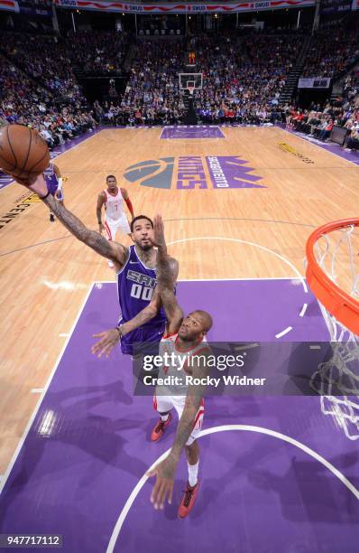 Willie Cauley-Stein of the Sacramento Kings shoots against PJ Tucker of the Houston Rockets on April 11, 2018 at Golden 1 Center in Sacramento,...