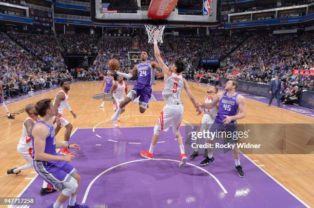 Buddy Hield of the Sacramento Kings goes up for the shot against Zhou Qi of the Houston Rockets on April 11, 2018 at Golden 1 Center in Sacramento,...