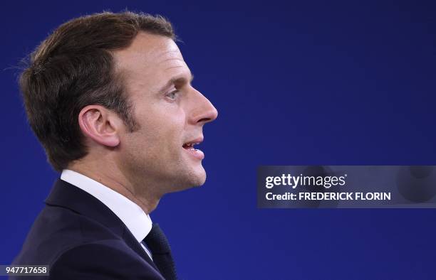 French President Emmanuel Macron speaks during the opening of a series of citizen's consultation meetings on Europe on April 17 in Epinal,...