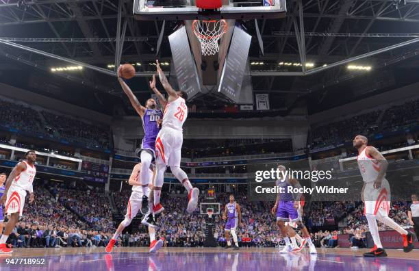 Willie Cauley-Stein of the Sacramento Kings goes up for the shot against Tarik Black of the Houston Rockets on April 11, 2018 at Golden 1 Center in...