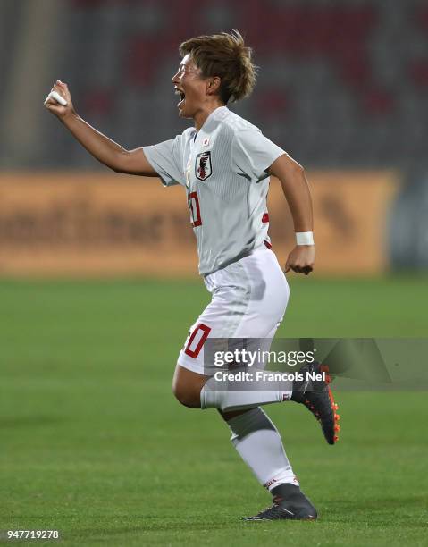 Yokoyama Kumi of Japan celebrates scoring a penalty during the AFC Women's Asian Cup semi final match between China and Japan at the King Abdullah II...