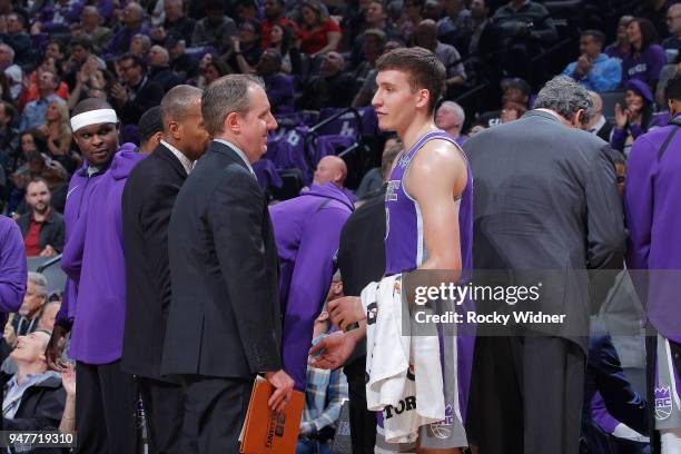 Assistant coach Bryan Gates of the Sacramento Kings coaches Bogdan Bogdanovic against the Houston Rockets on April 11, 2018 at Golden 1 Center in...