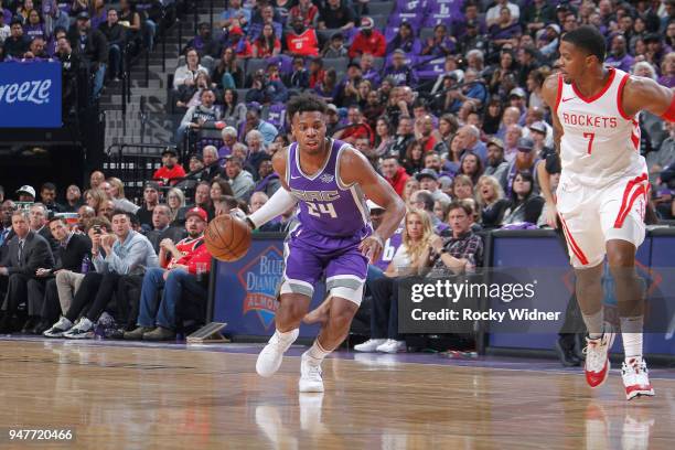 Buddy Hield of the Sacramento Kings drive against Joe Johnson of the Houston Rockets on April 11, 2018 at Golden 1 Center in Sacramento, California....