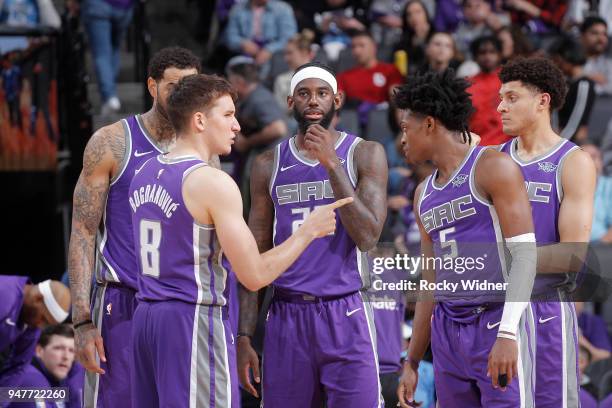 Bogdan Bogdanovic, JaKarr Sampson, De'Aaron Fox and Justin Jackson of the Sacramento Kings huddle during the game against the Houston Rockets on...