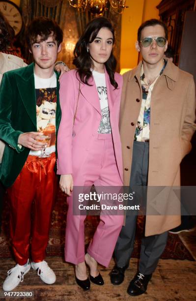 Alex Lawther, Gala Gordon and James Righton attend a dinner hosted by Gucci to celebrate #GucciHallucination: A Limited Line featuring artworks by...