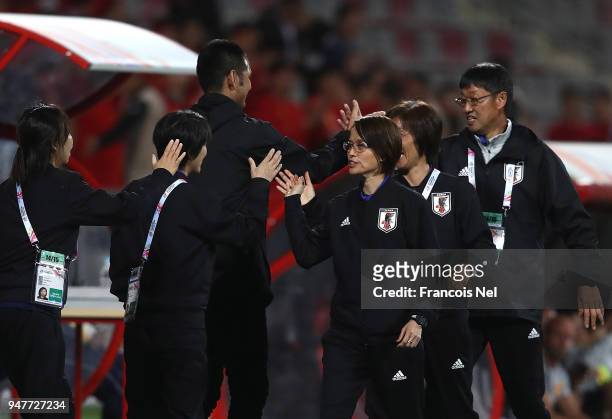 Head coach of Japan, Asako Takemoto celebrates after the AFC Women's Asian Cup semi final match between China and Japan at the King Abdullah II...