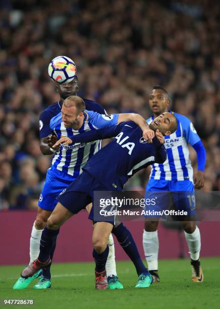 Lucas Moura and Moussa Sissoko of Tottenham Hotspur in action with Glenn Murray and Jose Izquierdo of Brighton and Hove Albion during the Premier...