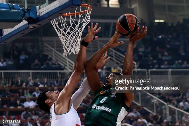 Adreian Payne, #6 of Panathinaikos Superfoods Athens competes with Gustavo Ayon, #14 of Real Madrid during the Turkish Airlines Euroleague Play Offs...