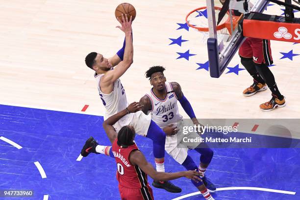 Ben Simmons of the Philadelphia 76ers lays up a shot against Josh Richardson of the Miami Heat during game two of round one of the 2018 NBA Playoffs...