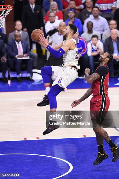Ben Simmons of the Philadelphia 76ers lays up a shot against James Johnson of the Miami Heat during game two of round one of the 2018 NBA Playoffs on...