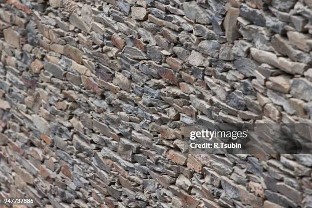 wall of slate, very typical mediterranean construction - chert stock pictures, royalty-free photos & images