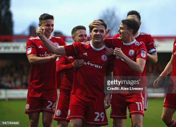 Billy Kee of Accrington Stanley celebrates after scoring his first goal with team mates during the Sky Bet League Two match between Accrington...