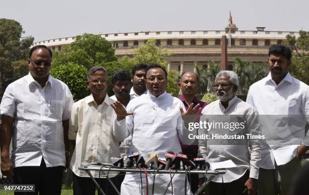 Congress MPs speak to media personnel, after meeting President Ramnath Kovind regarding Andhra Pradesh Special status on April 17, 2018 in New Delhi,...