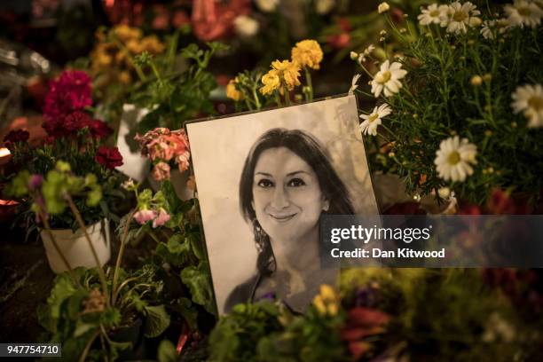 Flowers and tributes for the murdered Maltese journalist Daphne Caruana Galizia and Slovak journalists Jan Kuciak and his fiancee, Martina Kusnirova,...