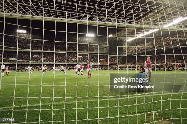 Despair for David Seaman of Arsenal as he watches his dream of winning the cup fade away during the UEFA Champions League Quarter Finals second leg...