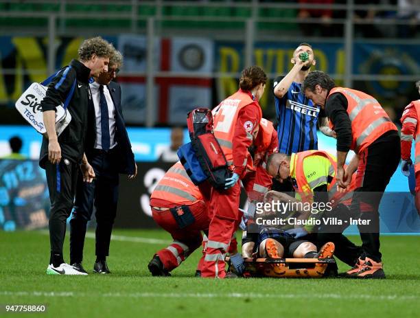 Roberto Gagliardini of FC Internazionale leaves the pitch on a stretcher during the serie A match between FC Internazionale and Cagliari Calcio at...