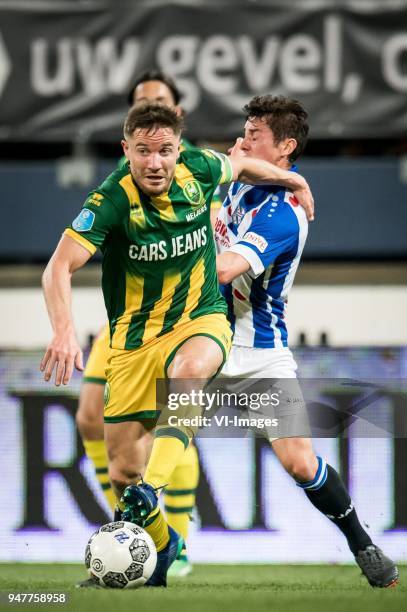 Aaron Meijers of ADO Den Haag, Marco Rojas of sc Heerenveen during the Dutch Eredivisie match between sc Heerenveen and ADO Den Haag at Abe Lenstra...