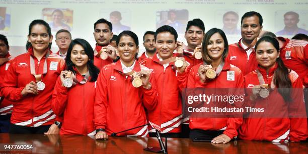 Medal winner shooters Ravi Kumar Anjum Moudgil, Tejaswini Sawant, Jitu Rai, Mehuli Ghosh, Heena Sidhu, Apurvi Chandela, Om Mitharval and...