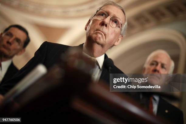 Senate Majority Leader Mitch McConnell talks to reporters with Sen. John Barrasso and Senate Majority Whip John Cornyn following the Senate...