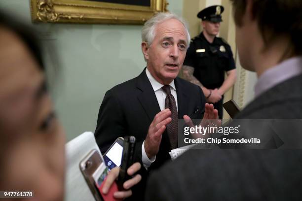 Senate Foreign Relations Committee Chairman Bob Corker talks with reporters before stepping into the weekly Republican policy luncheon at the U.S....