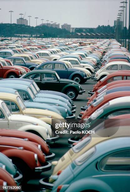 Wolfsburg, Volkswagen factory, bug models parked on factory compound.