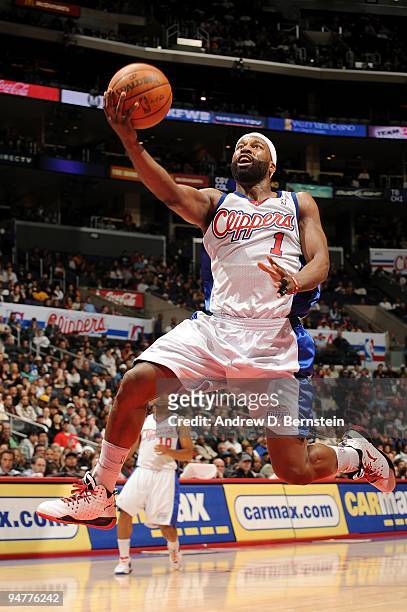 Baron Davis of the Los Angeles Clippers lays up a shot during the game against the San Antonio Spurs on December 13, 2009 at Staples Center in Los...