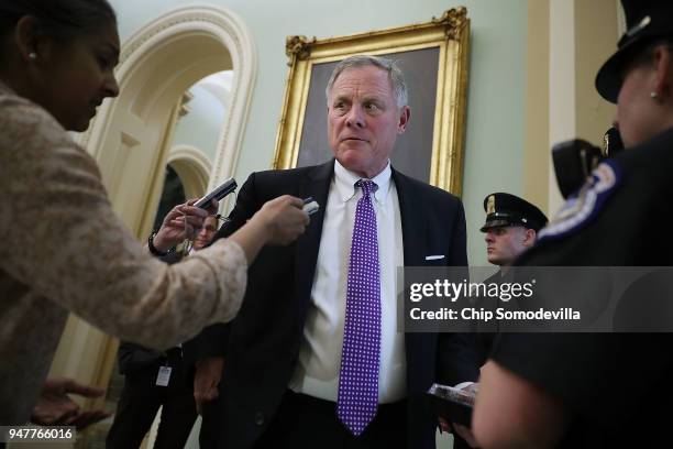Senate Intelligence Committee Chairman Richard Burr talks with reporters before stepping into the weekly Republican policy luncheon at the U.S....