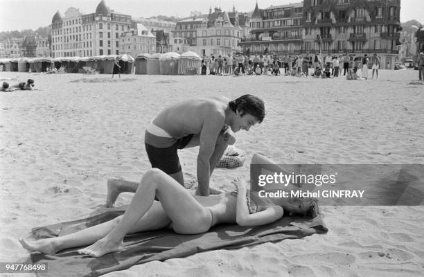 During the shooting of Three Men to be Shot Down by Jacques Deray, French actor Alain Delon and his female counterpart Dalila di Lazzarogo go...