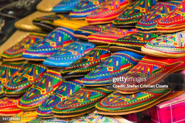 colorful slippers (babouches) for sale in morocco - multi coloured shoe stock pictures, royalty-free photos & images