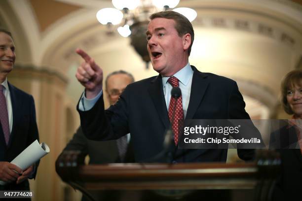 Sen. Michael Bennet talks with reporters following the weekly Democratic policy luncheon at the U.S. Capitol April 17, 2018 in Washington, DC. Noting...