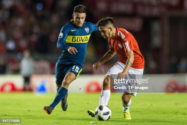 Nahitan Nandez of Boca Juniors and Martin Benitez of Independiente battle for the ball during a match between Independiente and Boca Juniors as part...