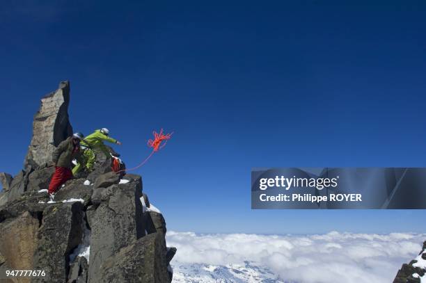 Ski alpinisme,le rappel,Val thorens, savoie France, MR doing abseil in Val Thorens ski resort, savoy, France, MR.