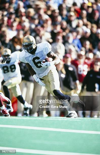 Malcolm Johnson of the Notre Dame Fighting Irish runs with the ball during the game against the Boston College Eagles at Alumni Stadium on November...