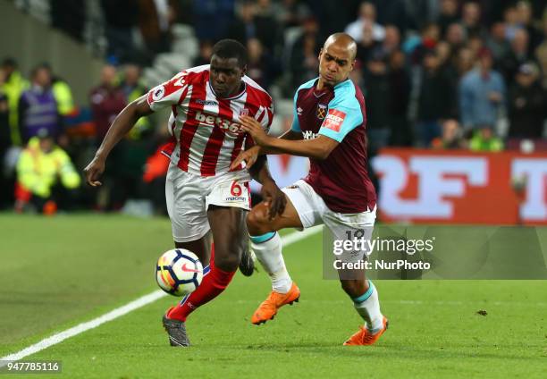 Stoke City's Kurt Zouma takes on West Ham United's Joao Mario during English Premier League match between West Ham United and Stoke City at London...