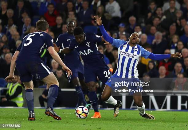 Jose Izquierdo of Brighton and Hove Albion is fouled by Serge Aurier of Tottenham Hotspur which leads to Brighton and Hove Albion being awarded a...