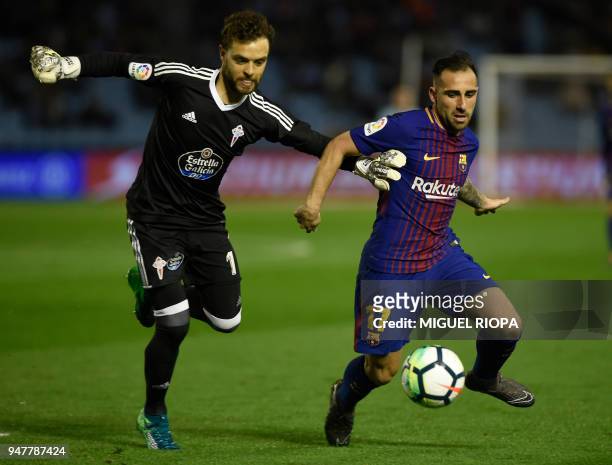 Celta Vigo's Spanish goalkeeper Sergio Alvarez vies with Barcelona's Spanish forward Paco Alcacer during the Spanish league football match between RC...