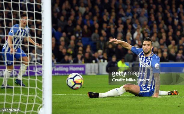 Shane Duffy of Brighton and Hove Albion looks on as he almost scores an own goal during the Premier League match between Brighton and Hove Albion and...