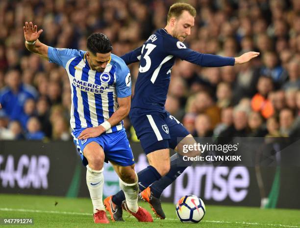 Brighton's Israeli midfielder Beram Kayal vies with Tottenham Hotspur's Danish midfielder Christian Eriksen during the English Premier League...