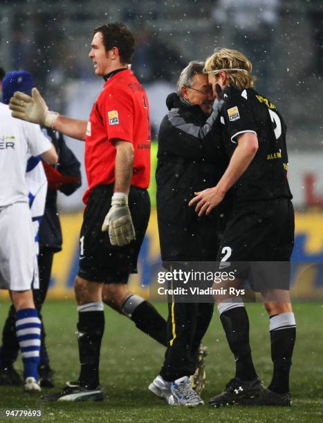 Coach Michael Krueger of Aachen celebrates with Nico Herzig after winning 0:2 the Second Bundesliga match between MSV Duisburg and Alemannia Aachen...