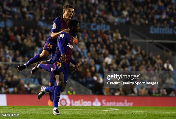 Ousmane Dembele of FC Barcelona celebrates with his team-mates after scoring his team's first goal during the La Liga match between Celta de Vigo and...