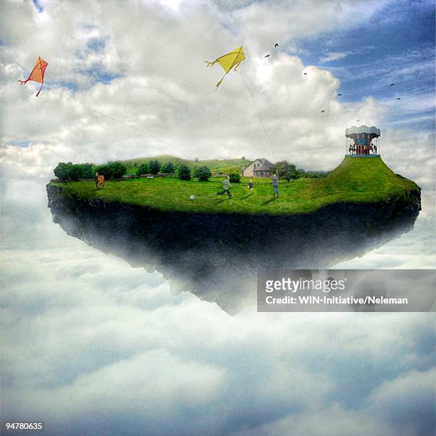 boys playing on an island levitating in the sky, republic of ireland - dreamlike stock pictures, royalty-free photos & images