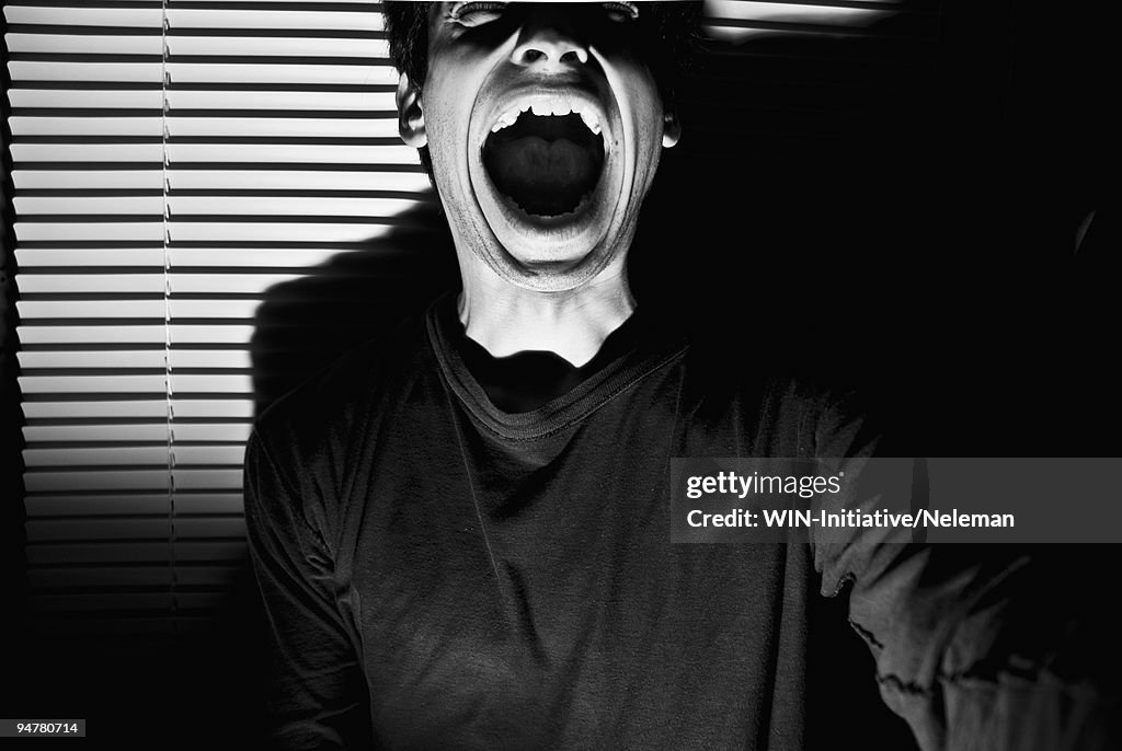 Close-up of a man screaming