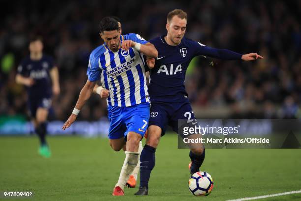 Beram Kayal of Brighton and Hove Albion in action with Christian Eriksen of Tottenham Hotspur during the Premier League match between Brighton and...