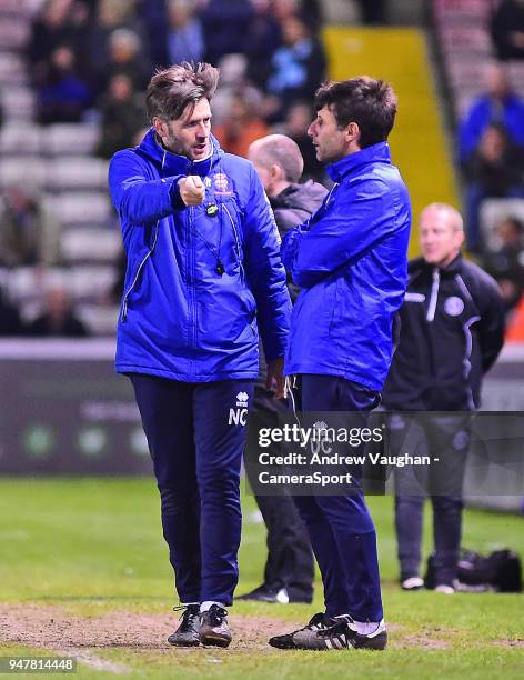 Lincoln City's assistant manager Nicky Cowley, left, and Lincoln City manager Danny Cowley in their technical area during the Sky Bet League Two...