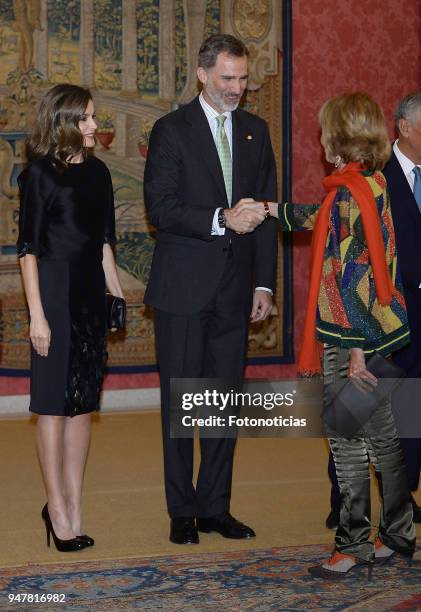 King Felipe VI of Spain, Queen Letizia of Spain and the President of Protugal Marcelo Rebelo de Sousa attend a reception at El Pardo Palace on April...