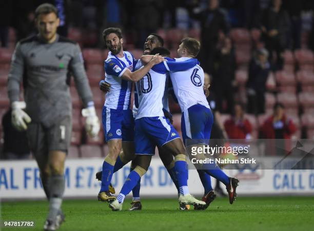 William Grigg of Wigan Athletic celebrates after scoring during the Sky Bet League One match between Wigan Athletic and Oxford United at DW Stadium...