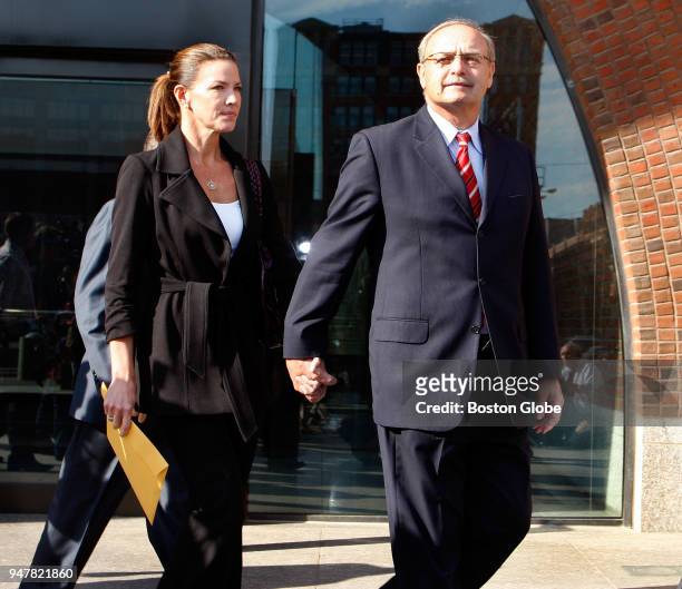 Former Massachusetts House Speaker Sal F. DiMasi, accompanied by his wife, leaves the Moakley Courthouse in Boston on June 2 after being indicted by...