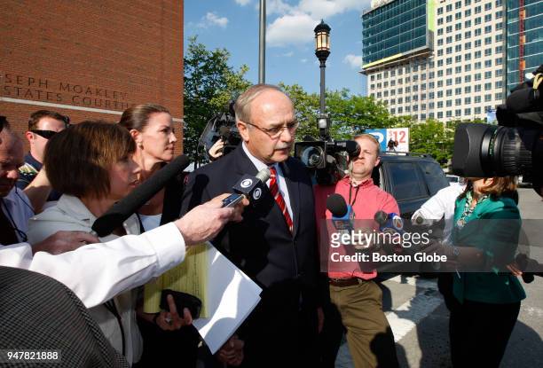Former Massachusetts House Speaker Sal F. DiMasi, accompanied by his wife, leaves the Moakley Courthouse in Boston on June 2 after being indicted by...