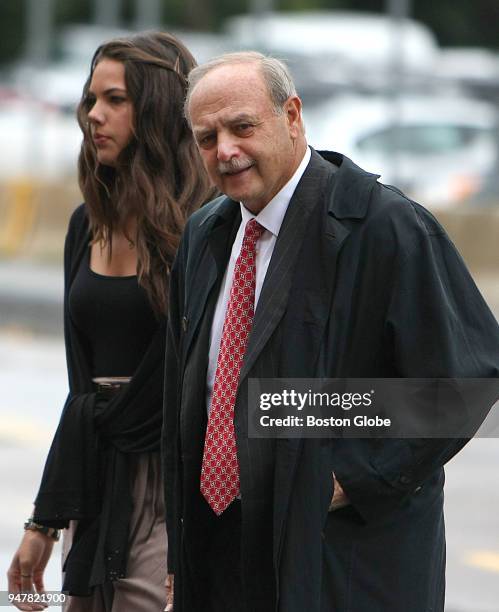 Former Massachusetts House Speaker Sal F. DiMasi, accompanied by his stepdaughter, arrives to the Moakley Courthouse in Boston on Sept. 8 for the...